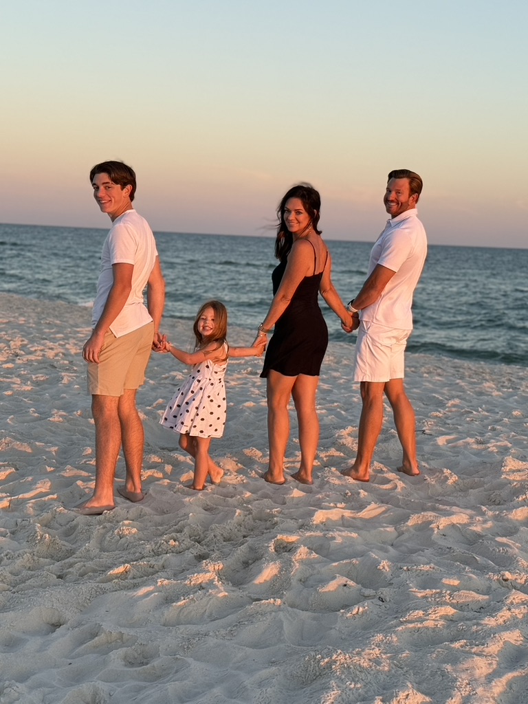 Nick Hiter with his family on the beach